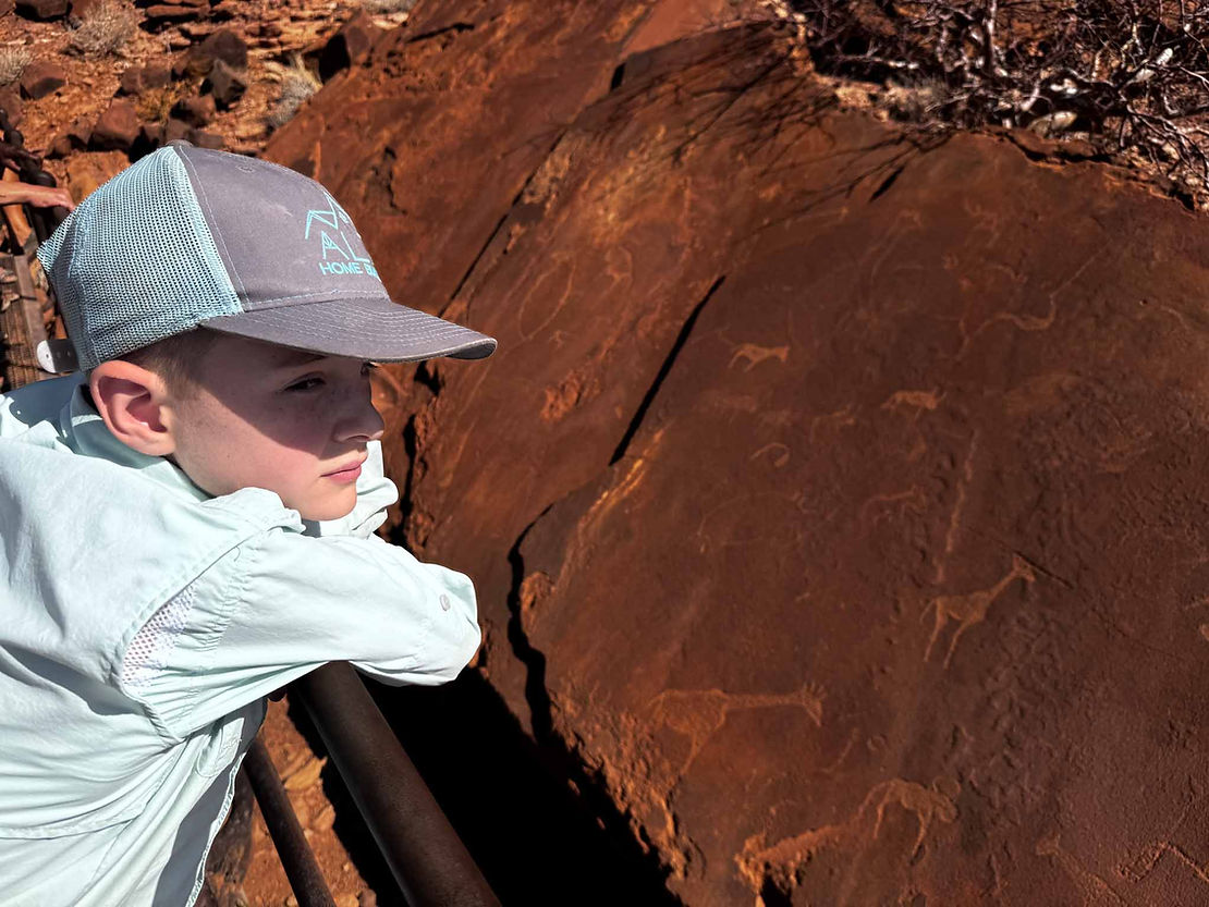 The most interesting petroglyph is next to Tim's hat - an African penguin