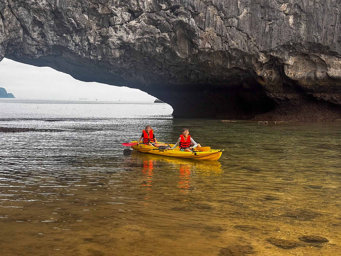 Tim and Hiro finding travelling unknown waters on the other side of a sea cave.