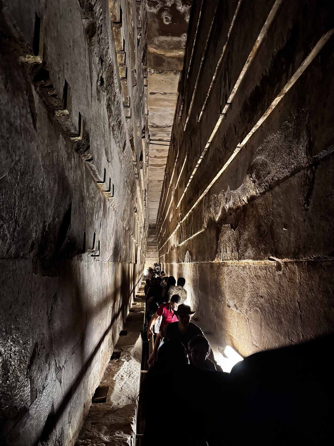 The "grand gallery" inside the pyramid. the photo doesn't capture it, but the hallway is at a 45 degree upward angle. 
