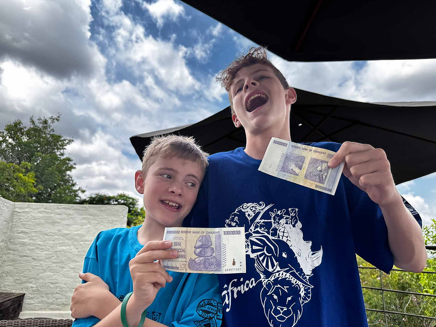 The boys become 10 billiondollaraires for Christmas. Zimbabwe suffered from hyperinflation prior to changing to using the US dollar, in 2008 getting up to 79,600,000,000% per MONTH. Now the currency is just useful as a souvineer.