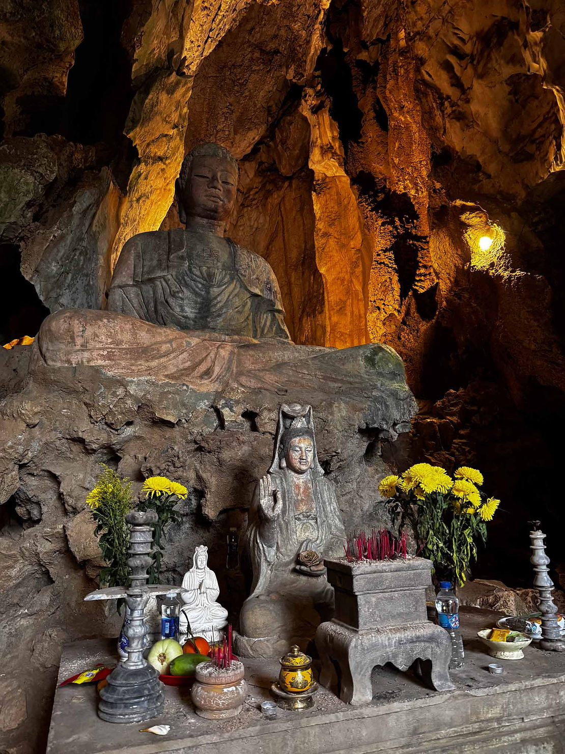 Statues and temples are carved right into the limestone caves at Marble Mountain.
