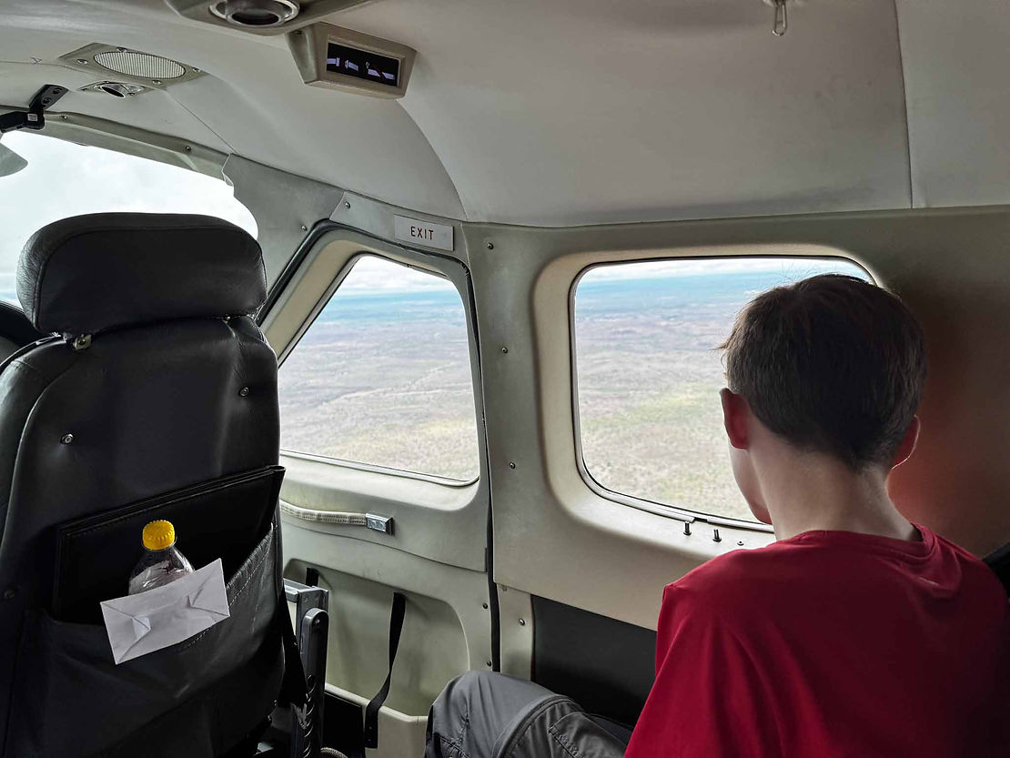 Neil watching elephants as we start to land.
